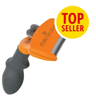 Cepillo Furminator con mango negro y cabezal naranja, texto visible: FURminator y FURejector. Sello amarillo con texto en inglés: TOP SELLER.