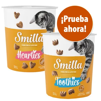 Envases de snacks para gatos Smilla Hearties y Smilla Toothies, 125 g. Texto visible: '¡Prueba ahora!'. Imagen de gato en el envase. Hecho en Alemania.