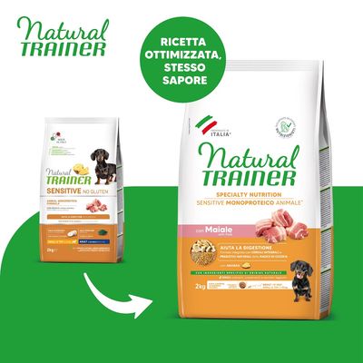Due confezioni di crocchette per cani Natural Trainer Sensitive con Maiale, testo visibile: 'Ricetta ottimizzata, stesso sapore', 2 kg, aiuta la digestione, preparato in Italia.
