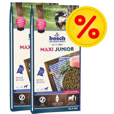 To poser bosch Maxi Junior hundefoder, 15,0 kg, med tekst: 24 protein, 12 fedtindhold, uden hvede, kolostrum, immun kompleks. Stor gul procent-tegn badge for tilbud.