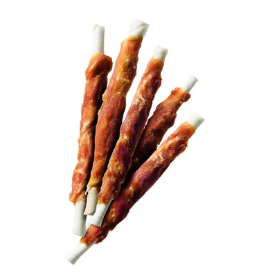Four chew snacks made from white beef hide sticks, wrapped with dried chicken meat.
