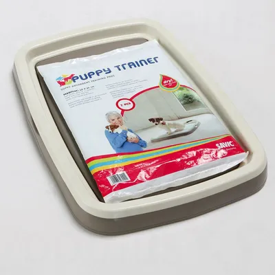 Zestaw Savic Puppy Trainer: tacka treningowa i opakowanie podkładów chłonnych, widoczny napis 'Puppy Trainer', 7 sztuk, rozmiar medium 45×30 cm.