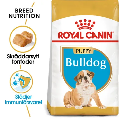 Royal Canin Puppy Bulldog torrfoder, text: Skräddarsytt torrfoder, Stödjer immunförsvaret. Bild på foderbit och bulldogvalp på förpackningen.