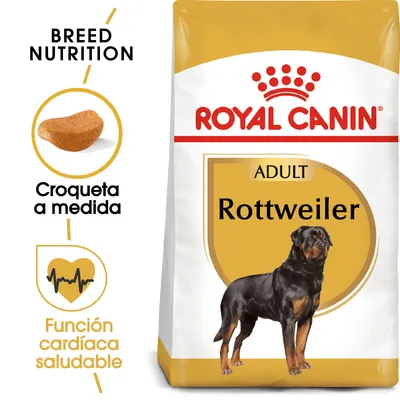 Royal Canin ADULT Rottweiler, croqueta a medida, función cardíaca saludable. Imagen de un perro Rottweiler en el envase.