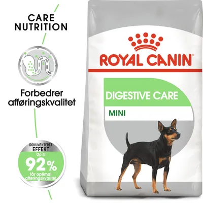 ROYAL CANIN DIGESTIVE CARE MINI hundefoder. Tekst: Forbedrer afføringskvalitet, dokumenteret effekt op til 92 % får optimal afføringskvalitet. Billede af lille sort/brun hund.