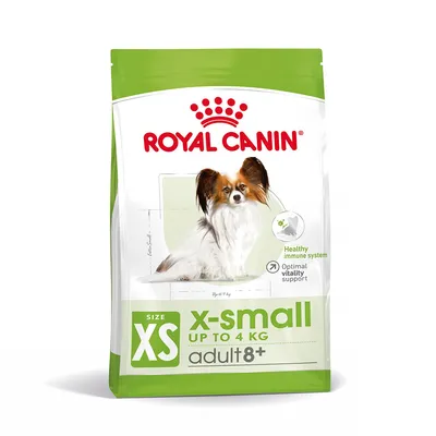 Royal Canin x-small adult 8+, size XS, fino a 4 kg. Testo visibile: Healthy immune system, Optimal vitality support. Immagine di un cane piccolo sulla confezione. Royal Canin x-small adult 8+, size XS, fino a 4 kg. Testo visibile: Healthy immune system, Optimal vitality support. Immagine di un cane piccolo sulla confezione.