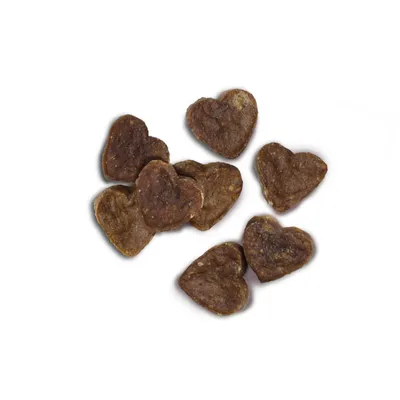 Hjärformade bruna snacks, synliga i lös ordning. Ingen ytterligare information eller förpackning synlig.