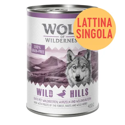 Wolf of Wilderness Wild Hills, lattina singola 400 g, 100% grain-free, anatra con frutti di bosco, radici ed erbe selvatiche. Testo in tedesco e inglese visibile sull'etichetta.