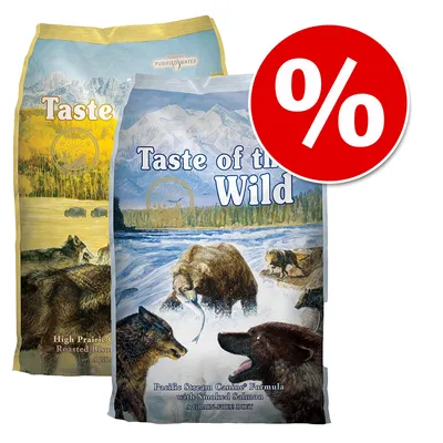 Twee zakken Taste of the Wild hondenvoer, varianten High Prairie Canine en Pacific Stream Canine. Grote rode kortingssymbool met procentteken zichtbaar rechtsboven.
