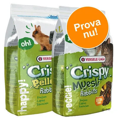 Två påsar Versele-Laga Crispy Rabbits: en med texten 'Crispy Pellets Rabbits' och en med 'Crispy Muesli Rabbits', orange cirkel med texten 'Prova nu!'.