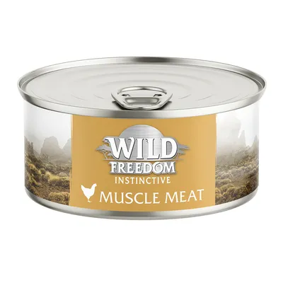Wild Freedom Instinctive Muscle Meat, konzerva z rumeno etiketo in simbolom piščanca.
