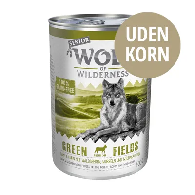 Wolf of Wilderness Senior Green Fields dåse 400 g, lam & kylling, 100% grain-free, UDEN KORN, billede af ulv og landskab på emballagen Wolf of Wilderness Senior Green Fields dåse 400 g, lam & kylling, 100% grain-free, UDEN KORN, billede af ulv og landskab på emballagen