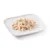 Close-up of tender, white chicken meat strips on a white plate, served in natural juice.
