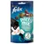 Purina felix party mix Friandises Saveur de l’Océan, au goût de Saumon, de Colin et de Truite, 2 kcal par friandise en moyenne, sachet avec illustration de chat noir et blanc.