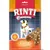 Embalagem de snacks para cão Rinti Extra Chicko mit Käsestückchen. Texto visível: 'FETTREDUZIERT', 'MIT 100% HUHNFILET', 'LUFTGETROCKNET'. Imagem de cão e snacks com pedaços claros.