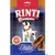 Embalagem de snacks para cães Rinti Extra Chicko, com imagem de cão, pedaços de snack e texto visível: '100% Filet', 'Mit Huhn & Ente', 'Fettreduziert', 'Luftgetrocknet'.