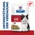 Hill's Prescription Diet i/d, Unterstützung der Verdauung, Abbildung einer Katze und Futterstücken, Fischsymbol oben rechts. Hill's Prescription Diet i/d, Unterstützung der Verdauung, Abbildung einer Katze und Futterstücken, Fischsymbol oben rechts.