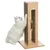 White cat scratching a scratching furniture made of wood with cardboard insert and integrated toy. Product for keeping cats occupied and caring for claws.