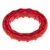 Red play ring made of plastic with a wavy surface and small white dots.