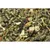 Mélange d’aliments pour petits animaux composé de granulés verts, morceaux de fleurs séchées et herbes visibles. Aucun emballage ou marque apparente.