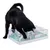Black cat playing with interactive food toy made of plastic containing dry food.