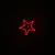 Red star as laser projection on black background.