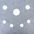 Plaque en feutre gris avec sept trous ronds de tailles différentes disposés en motif symétrique. Matériau visible : feutre.