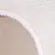 Close-up of white, fluffy material, possibly for pet products such as beds or blankets.