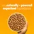 Bowl of kibble with text stating: with naturally-powered superfood ingredients.