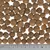 Close-up of brown, round dry food pieces with size comparison using a ruler in centimetres.