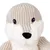 Plush toy shaped like a beige-white otter with striped fabric and soft surface.