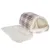 Tunnel pour animal en tissu à motif carreaux marron et blanc, intérieur crème, avec coussin amovible en fausse fourrure blanche visible à côté.