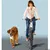Bicycle holder for dogs, shows safe distance between dog and bicycle while riding.