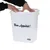 White food box with 'Bon Appétit!' inscription and zooplus basics logo. Hands closing the box lid.