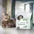Zak kattenbakvulling met merknaam Joe'sCat, zichtbaar: klonterende variant, 3 kg, afbeelding van kat op de verpakking, diverse pictogrammen en groene wereldkaartdecoratie.