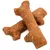 Braune, knochenförmige Hundesnacks aus gepresstem Material, sichtbar mit körniger Textur.