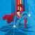Couverture en tissu avec illustration de Superman en costume bleu et rouge, cape déployée, logo S jaune sur la poitrine, fond bleu à motifs graphiques.