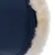 Gros plan sur une surface en similicuir bleu avec bordure en fausse fourrure blanche, couture visible. Matériaux : similicuir et fausse fourrure.