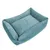 Letto rettangolare per pet in tessuto turchese con design a coste e lati imbottiti.