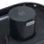 Bouton rond noir avec inscription « SET » et port marqué « Type-c » sur un appareil en plastique noir.