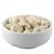White bowl with small, light dry food pieces. Product image shows the consistency and shape of the food pieces.