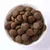 Schale mit runden, braunen Trockenfutter-Pellets. Produktabbildung zur Ansicht der Form und Größe. Schale mit runden, braunen Trockenfutter-Pellets. Produktabbildung zur Ansicht der Form und Größe.
