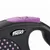 Manico di guinzaglio avvolgibile Flexi con pulsante viola e dettagli a pois rosa. Marchio flexi visibile sul lato.