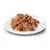 Close-up of brown meat pieces in gravy on a white plate, shown as an example of pet food.