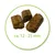 Three brown food pieces, approximately 12–25 mm in size, shown in a green circle.