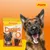 Josera Denties mit Ente und Karotte, getreidefrei. Packung mit 7 Sticks. Hund hält einen Stick im Maul. Josera Logo oben rechts.