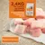 2,4 kg de viande de dinde désossée comme ingrédient principal dans le pack Nature’s Variety Original 2 kg. Morceaux de dinde crue visibles sur papier.
