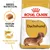 Balení krmiva ROYAL CANIN ADULT Dachshund, obrázek granule na míru, text: Granule na míru, Podpora kostí a kloubů, Breed Nutrition. Balení krmiva ROYAL CANIN ADULT Dachshund, obrázek granule na míru, text: Granule na míru, Podpora kostí a kloubů, Breed Nutrition.