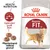 Balení Royal Canin Regular Fit 32, text: Health Nutrition, Optimální profil živin, Přizpůsobená velikost granulí, obrázek tří granulí a kočky na obalu.