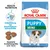 ROYAL CANIN PUPPY MINI hundfoderpåse, text: Health Nutrition, Unterstützung der körpereigenen Abwehrkräfte, Spezielle Krokettengröße und -form. Bild på tre foderbitar.